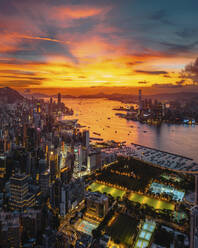 Aerial view of Hong Kong skyline with financial area skyscrapers at sunset. - AAEF22206