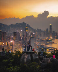 Aerial view of Hong Kong skyline with financial area skyscrapers at sunset. - AAEF22208