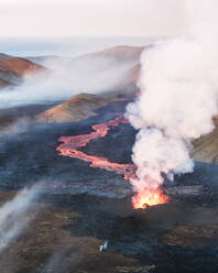 Aerial view of Litli-Hrutur (Little Ram) Volcano during an eruption on Fagradalsfjall volcanic area in southwest Iceland, it's a fissure eruption started on the Reykjanes Peninsula, Iceland. - AAEF22247