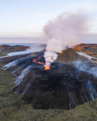 Aerial view of Litli-Hrutur (Little Ram) Volcano during an eruption on Fagradalsfjall volcanic area in southwest Iceland, it's a fissure eruption started on the Reykjanes Peninsula, Iceland. - AAEF22248