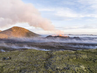 Aerial view of Litli-Hrutur (Little Ram) Volcano during an eruption on Fagradalsfjall volcanic area in southwest Iceland, it's a fissure eruption started on the Reykjanes Peninsula, Iceland. - AAEF22253