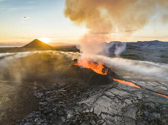 Aerial view of Litli-Hrutur (Little Ram) Volcano during an eruption on Fagradalsfjall volcanic area in southwest Iceland, it's a fissure eruption started on the Reykjanes Peninsula, Iceland. - AAEF22258