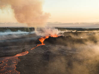 Aerial view of Litli-Hrutur (Little Ram) Volcano during an eruption on Fagradalsfjall volcanic area in southwest Iceland, it's a fissure eruption started on the Reykjanes Peninsula, Iceland. - AAEF22262