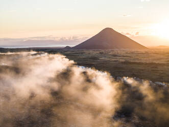 Aerial view of Litli-Hrutur (Little Ram) Volcano during an eruption on Fagradalsfjall volcanic area in southwest Iceland, it's a fissure eruption started on the Reykjanes Peninsula, Iceland. - AAEF22263