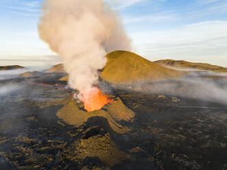 Aerial view of Litli-Hrutur (Little Ram) Volcano during an eruption on Fagradalsfjall volcanic area in southwest Iceland, it's a fissure eruption started on the Reykjanes Peninsula, Iceland. - AAEF22269
