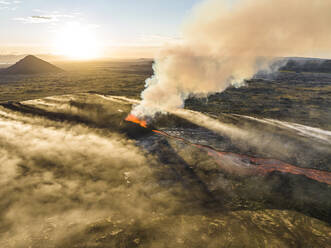 Aerial view of Litli-Hrutur (Little Ram) Volcano during an eruption on Fagradalsfjall volcanic area in southwest Iceland, it's a fissure eruption started on the Reykjanes Peninsula, Iceland. - AAEF22275