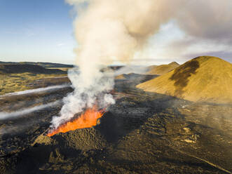 Aerial view of Litli-Hrutur (Little Ram) Volcano during an eruption on Fagradalsfjall volcanic area in southwest Iceland, it's a fissure eruption started on the Reykjanes Peninsula, Iceland. - AAEF22281