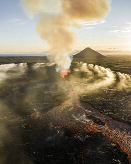 Aerial view of Litli-Hrutur (Little Ram) Volcano during an eruption on Fagradalsfjall volcanic area in southwest Iceland, it's a fissure eruption started on the Reykjanes Peninsula, Iceland. - AAEF22283