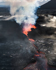 Aerial view of Litli-Hrutur (Little Ram) Volcano during an eruption on Fagradalsfjall volcanic area in southwest Iceland, it's a fissure eruption started on the Reykjanes Peninsula, Iceland. - AAEF22284