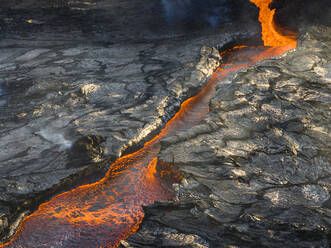 Aerial view of the magma flowing from the Litli-Hrutur (Little Ram) Volcano during an eruption on Fagradalsfjall volcanic area in southwest Iceland, Iceland. - AAEF22286