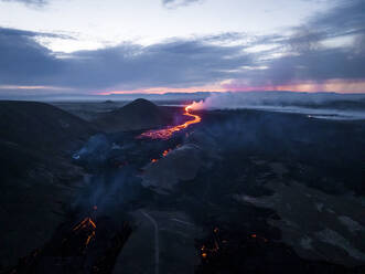 Aerial view of Litli-Hrutur (Little Ram) Volcano during an eruption on Fagradalsfjall volcanic area in southwest Iceland, it's a fissure eruption started on the Reykjanes Peninsula, Iceland. - AAEF22401