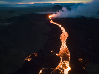 Aerial view of Litli-Hrutur (Little Ram) Volcano during an eruption on Fagradalsfjall volcanic area in southwest Iceland, it's a fissure eruption started on the Reykjanes Peninsula, Iceland. - AAEF22402