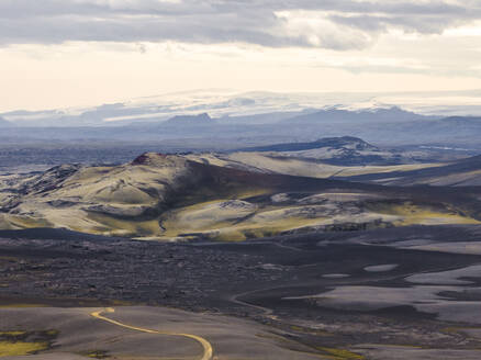 Aerial view of a valley with mountain in the highlands near Kirkjubaejarklaustur, Southern region, Iceland. - AAEF22409