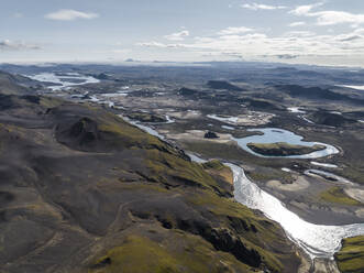 Aerial view of a beautiful mountain landscape with river at sunset, Kirkjubaejarklaustur, Southern region, Iceland. - AAEF22462
