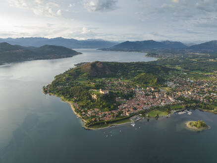 Aerial view of Angera, a small town along Lago Maggiore (Lake Maggiore) at sunset, Lombardy, Italy. - AAEF22486