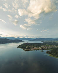 Aerial view of Angera, a small town along Lago Maggiore (Lake Maggiore) at sunset, Lombardy, Italy. - AAEF22491