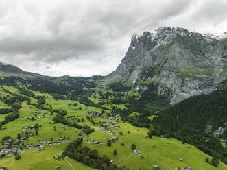 Aerial view of the Mettenberg mountain in Grindelwald town on Bernese Alps, Swiss Alps, Canton of Bern, Switzerland. - AAEF22514