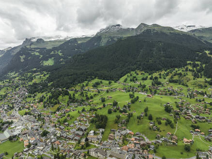 Aerial view of Grindelwald, a village on Bernese Alps in the Jungfrau region, Swiss Alps, Canton of Bern, Switzerland. - AAEF22518