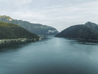 Aerial view of Lugano lake at sunset and Mount San Giorgio, Melide, Ticino, Switzerland. - AAEF22549