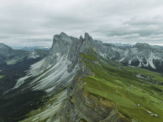 Aerial view of Seceda, a popular mountain peak on the Dolomites in the Odle/Geisler Group situated within Puez-Odle Nature Park in South Tyrol in Northern Italy. - AAEF22582