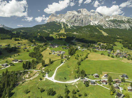 Aerial view of Cortina d'Ampezzo residential area with houses in the valley, Belluno province, Dolomites area, Veneto, Italy. - AAEF22755