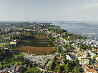 Aerial view of the Adriatic Sea coastline in Porec, a small town in Istria region of Croatia. - AAEF22795