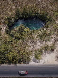 Aerial View of Cenote Car-Wash (Zazil-Ha) in Tulum, Riviera Maya, Mexico. - AAEF22857