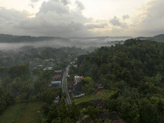 Aerial view of clouds in small village in the jungle close to Mathugama in Sri Lanka. - AAEF22883