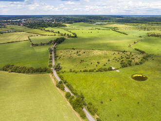 Aerial view of floodplains Amerongse Bovenpolder with meadows and road to Amerongen, national park Utrechtse Heuvelrug, province of Utrecht, Netherlands. - AAEF22904