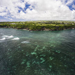 Aerial Drone View of the North Coast of Barbados. The shallow reefs reach right up the wave eroded cliffs, Saint Lucy, Barbados. - AAEF22930