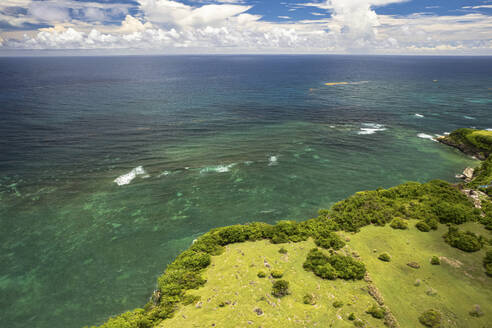 Aerial Drone View of the North Coast of Barbados, The reefs protect the cliffs from everything but the heaviest of storms, Saint Lucy, Barbados. - AAEF22931