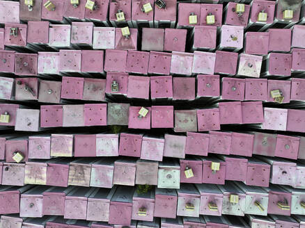 Aerial view of a phone box graveyard, a storage and dismantling facility for old phone boxes in Brandenburg, Germany. - AAEF22936