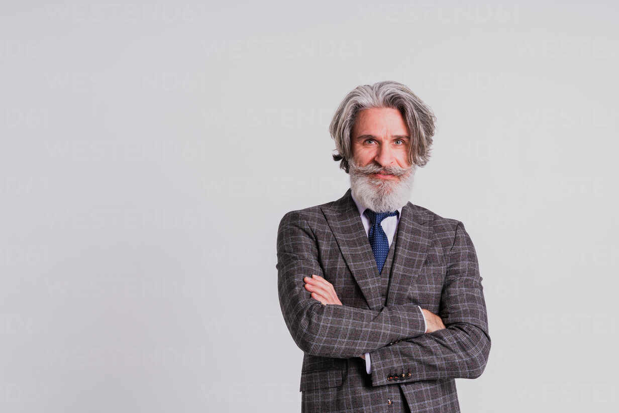 https://us.images.westend61.de/0001892257pw/senior-hipster-man-with-stylish-suit-portrait-DMDF05204.jpg