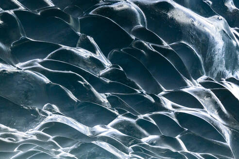 Full frame of textures in ice cave in Switzerland created by the passage of water over thousands of years - ADSF47617