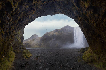 Spectacular scenery of large waterfall with clean water in cloudy day - ADSF47637