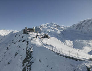 Panoramic view of from gornergrat train in switzerland and ski resort mountains in haze and sunlight - ADSF47773