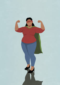 Portrait confident woman in superhero cape flexing biceps - FSIF06567