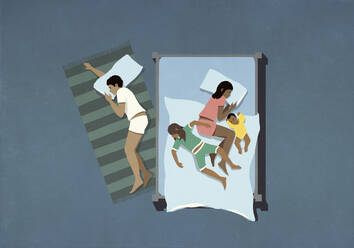 Father sleeping on floor next to wife and children in bed - FSIF06568