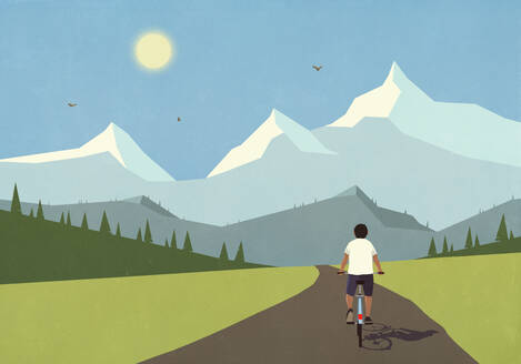Man cycling on remote valley road below sunny, idyllic, summer mountain range - FSIF06574