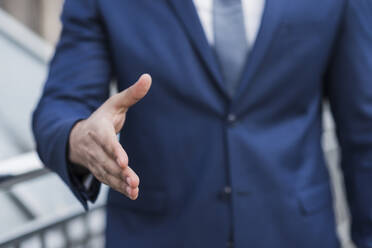 Close-up business man prepared to shake hand - INGF12712