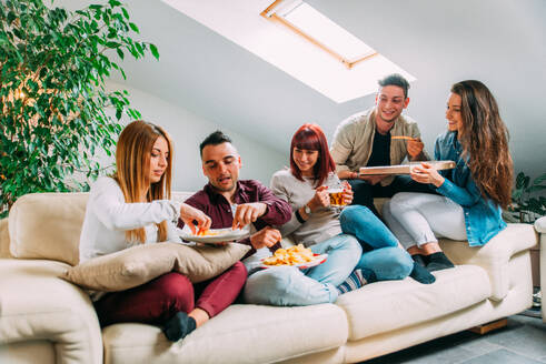 Group of happy friends bonding at home - Young adults having party and doing various activities - DMDF05547