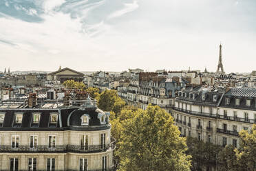 France, Ile-De-France, Paris, Residential district with Eiffel Tower in distant background - TAMF03963