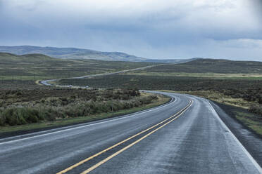 USA, Nevada, McDermitt, View of highway during stormy weather - TETF02274