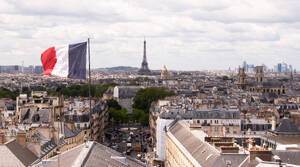 France, Paris, Cityscape with french flag and Eiffel tower in background - TETF02364