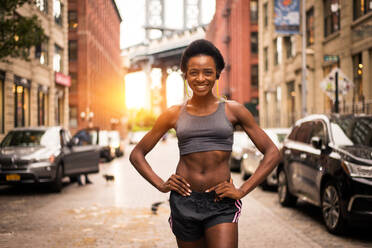 Young fitness woman running in New York - Sportive girl training outdoors, concepts about sport and healthy lifestyle - DMDF06444