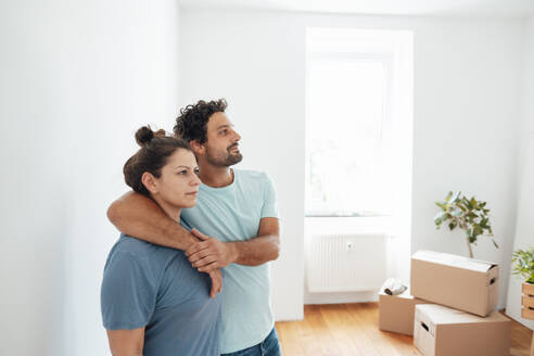 Man standing with woman at home - JOSEF21161