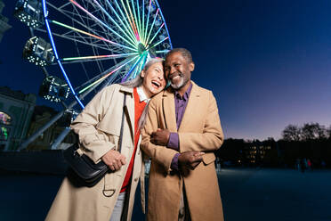 Storytelling image of a multiethnic senior couple in love - DMDF06666