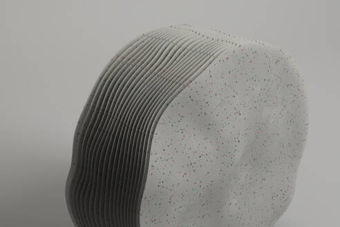 3D render of layers of white spotted material - GCAF00415