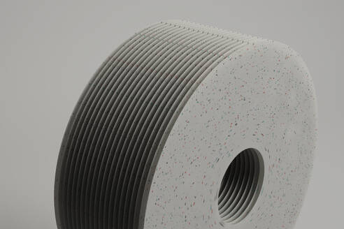 3D render of layers of white spotted material with hole in center - GCAF00417
