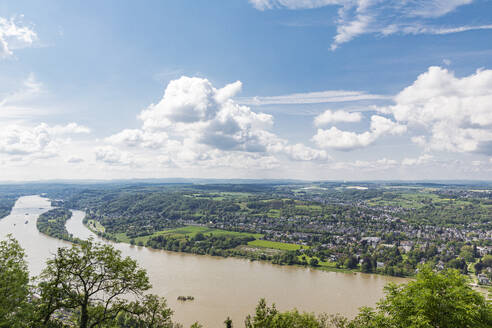 Germany, North Rhine Westphalia, Bonn, Clouds over riverside suburb in Drachenfels region - GWF07928